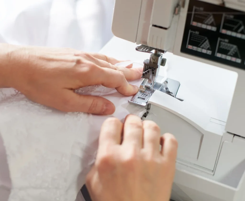 hands-at-stitching-and-repairing-process-with-whit-2026-03-17-01-41-42-utc